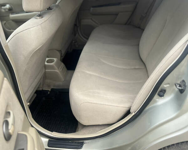 Желтый Ниссан Тиида, объемом двигателя 1.6 л и пробегом 204 тыс. км за 4300 $, фото 6 на Automoto.ua