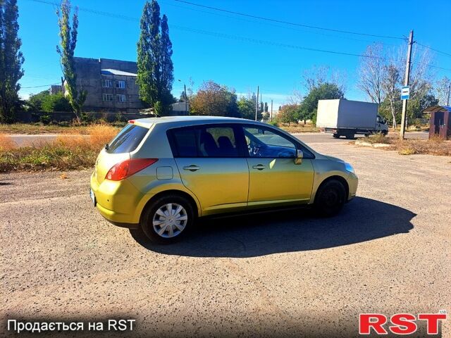 Желтый Ниссан Тиида, объемом двигателя 1.6 л и пробегом 192 тыс. км за 5300 $, фото 3 на Automoto.ua