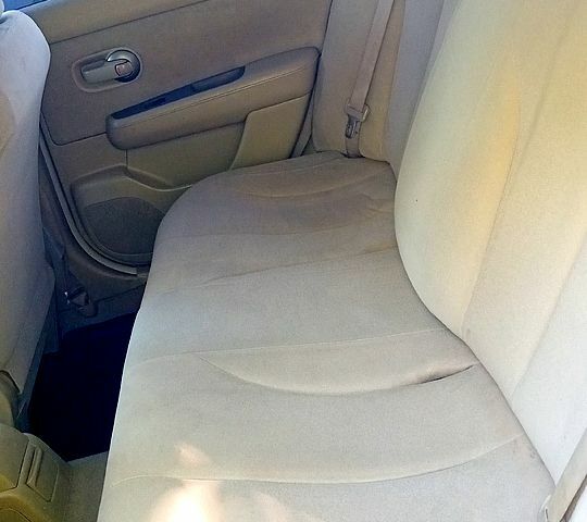 Желтый Ниссан Тиида, объемом двигателя 1.6 л и пробегом 202 тыс. км за 4750 $, фото 8 на Automoto.ua