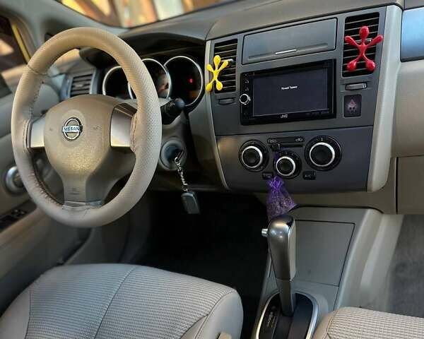 Жовтий Ніссан Тііда, об'ємом двигуна 1.6 л та пробігом 164 тис. км за 5999 $, фото 31 на Automoto.ua