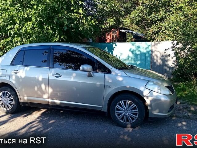 Желтый Ниссан Тиида, объемом двигателя 1.6 л и пробегом 202 тыс. км за 4750 $, фото 1 на Automoto.ua