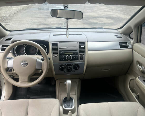 Желтый Ниссан Тиида, объемом двигателя 1.6 л и пробегом 204 тыс. км за 4300 $, фото 5 на Automoto.ua