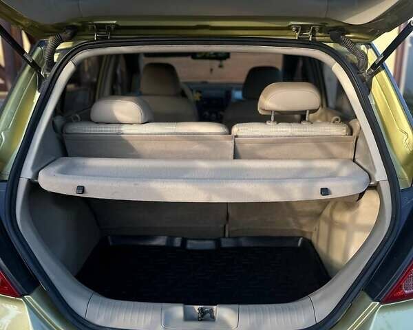 Жовтий Ніссан Тііда, об'ємом двигуна 1.6 л та пробігом 164 тис. км за 5999 $, фото 48 на Automoto.ua