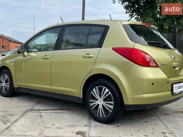 Желтый Ниссан Тиида, объемом двигателя 1.6 л и пробегом 100 тыс. км за 6990 $, фото 6 на Automoto.ua