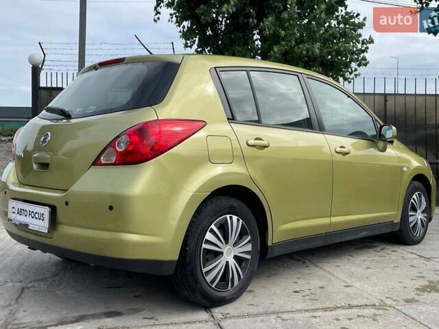 Желтый Ниссан Тиида, объемом двигателя 1.6 л и пробегом 100 тыс. км за 6990 $, фото 4 на Automoto.ua