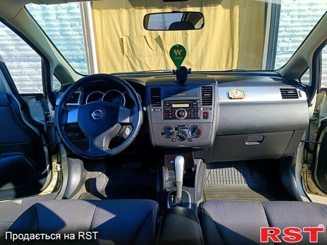 Желтый Ниссан Тиида, объемом двигателя 1.6 л и пробегом 192 тыс. км за 6100 $, фото 7 на Automoto.ua