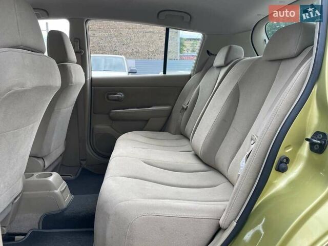 Желтый Ниссан Тиида, объемом двигателя 1.6 л и пробегом 100 тыс. км за 6990 $, фото 9 на Automoto.ua