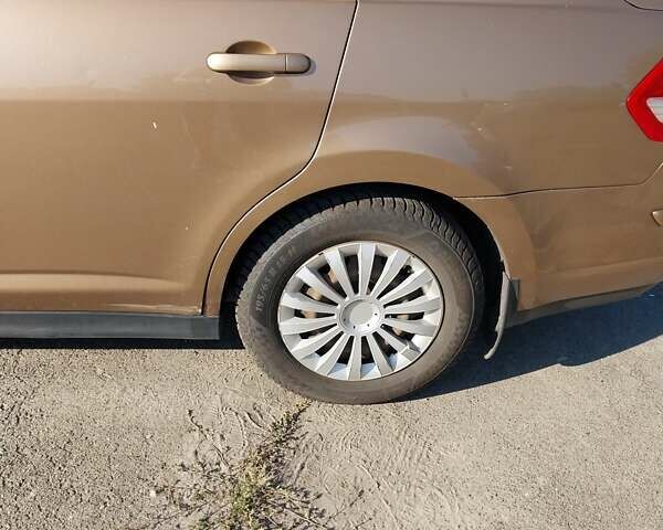 Желтый Ниссан Тиида, объемом двигателя 1.6 л и пробегом 325 тыс. км за 5350 $, фото 8 на Automoto.ua