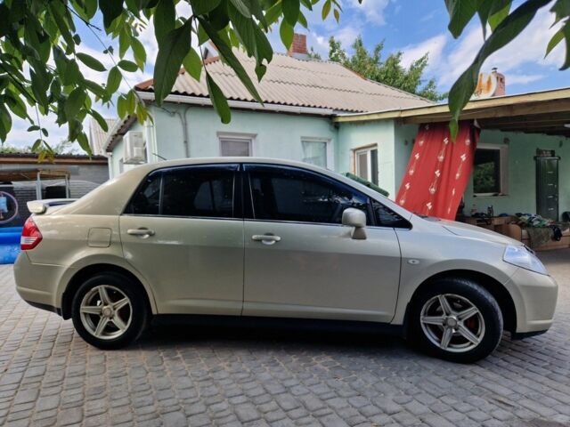 Жовтий Ніссан Тііда, об'ємом двигуна 1.6 л та пробігом 255 тис. км за 4999 $, фото 5 на Automoto.ua