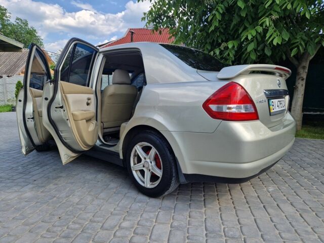 Жовтий Ніссан Тііда, об'ємом двигуна 1.6 л та пробігом 255 тис. км за 4999 $, фото 13 на Automoto.ua