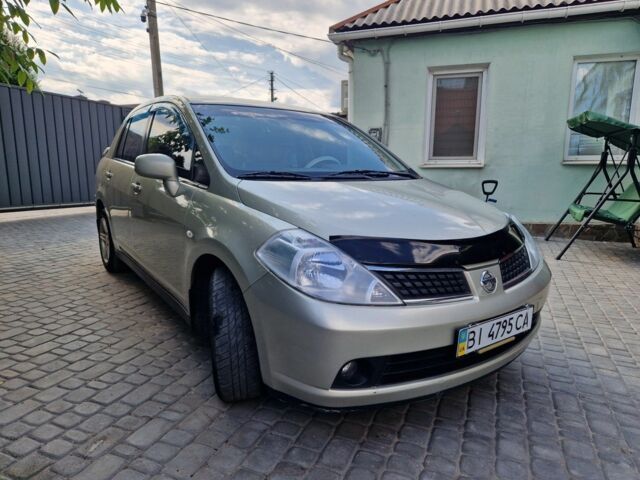 Жовтий Ніссан Тііда, об'ємом двигуна 1.6 л та пробігом 255 тис. км за 4999 $, фото 7 на Automoto.ua