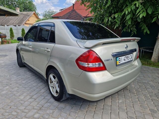 Жовтий Ніссан Тііда, об'ємом двигуна 1.6 л та пробігом 255 тис. км за 4999 $, фото 2 на Automoto.ua