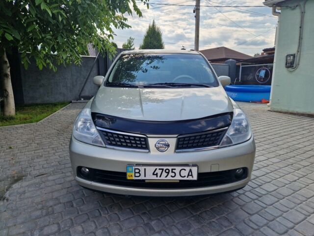 Жовтий Ніссан Тііда, об'ємом двигуна 1.6 л та пробігом 255 тис. км за 4999 $, фото 8 на Automoto.ua