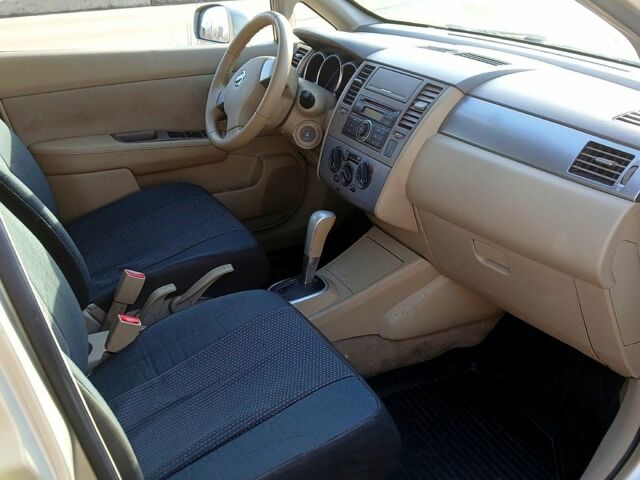 Желтый Ниссан Тиида, объемом двигателя 1.6 л и пробегом 200 тыс. км за 5000 $, фото 5 на Automoto.ua