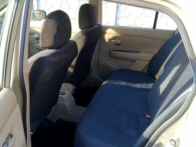 Желтый Ниссан Тиида, объемом двигателя 1.6 л и пробегом 200 тыс. км за 5000 $, фото 4 на Automoto.ua