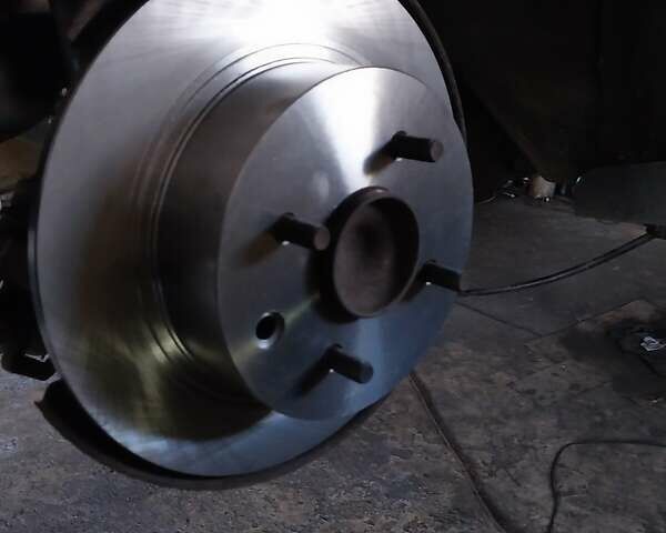 Желтый Ниссан Тиида, объемом двигателя 1.6 л и пробегом 325 тыс. км за 5350 $, фото 17 на Automoto.ua