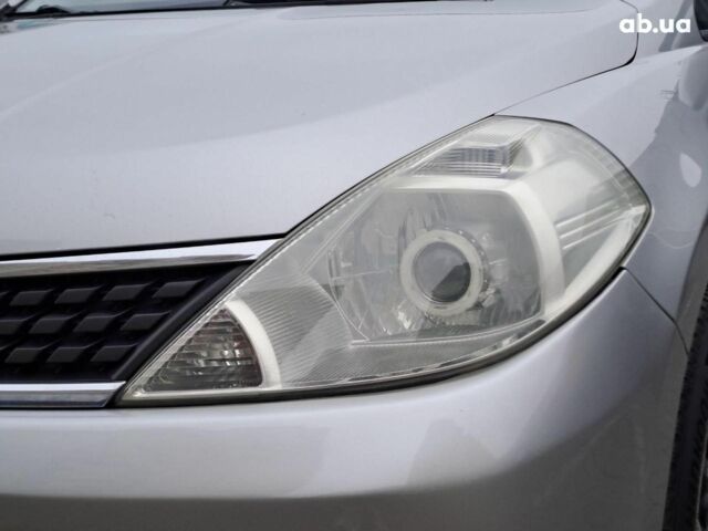 Серый Ниссан Тиида, объемом двигателя 1.6 л и пробегом 182 тыс. км за 6140 $, фото 7 на Automoto.ua