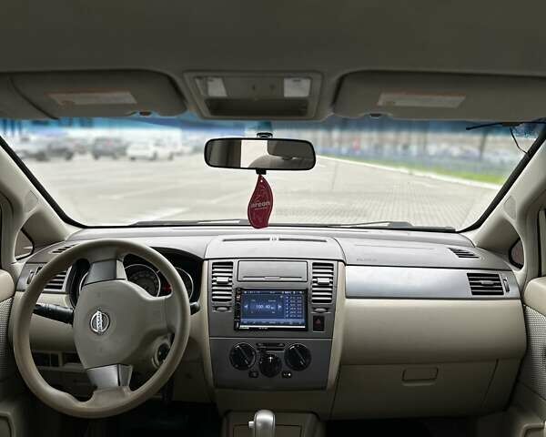 Серый Ниссан Тиида, объемом двигателя 1.8 л и пробегом 202 тыс. км за 4150 $, фото 10 на Automoto.ua