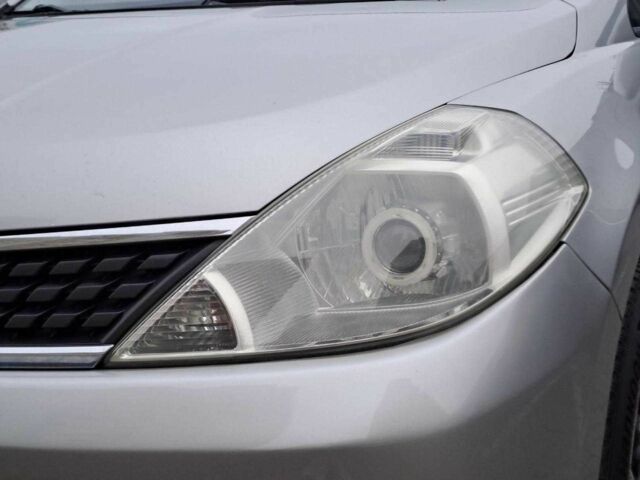 Серый Ниссан Тиида, объемом двигателя 1.6 л и пробегом 182 тыс. км за 6140 $, фото 7 на Automoto.ua