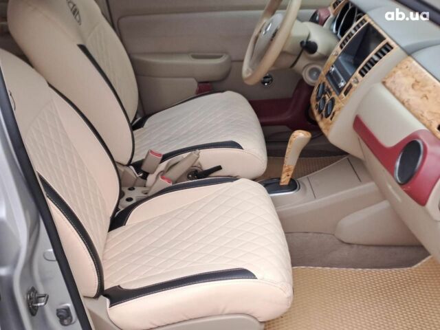 Серый Ниссан Тиида, объемом двигателя 1.6 л и пробегом 182 тыс. км за 6140 $, фото 14 на Automoto.ua