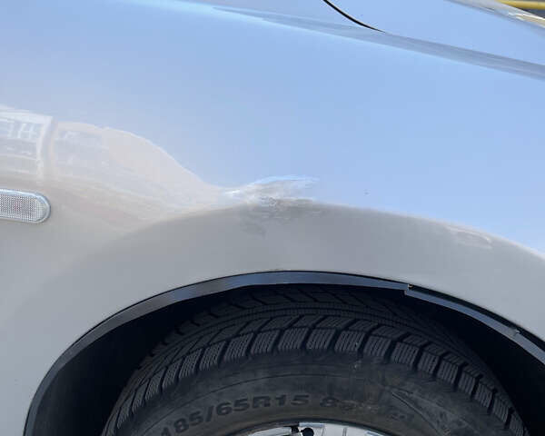 Серый Ниссан Тиида, объемом двигателя 1.6 л и пробегом 249 тыс. км за 5200 $, фото 11 на Automoto.ua