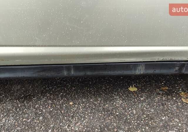 Серый Ниссан Тиида, объемом двигателя 1.6 л и пробегом 271 тыс. км за 5000 $, фото 19 на Automoto.ua