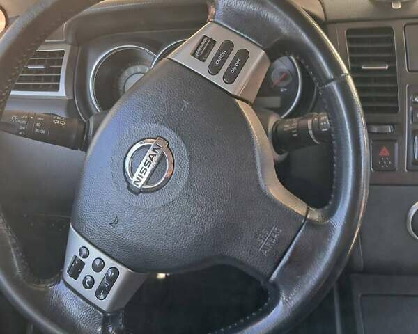 Серый Ниссан Тиида, объемом двигателя 1.6 л и пробегом 200 тыс. км за 5600 $, фото 4 на Automoto.ua