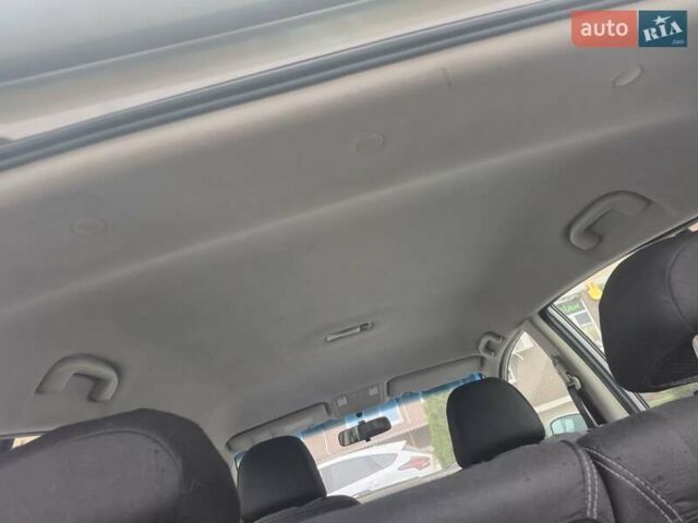 Серый Ниссан Тиида, объемом двигателя 1.6 л и пробегом 174 тыс. км за 5500 $, фото 4 на Automoto.ua