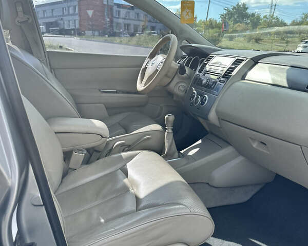 Серый Ниссан Тиида, объемом двигателя 0 л и пробегом 182 тыс. км за 4999 $, фото 7 на Automoto.ua