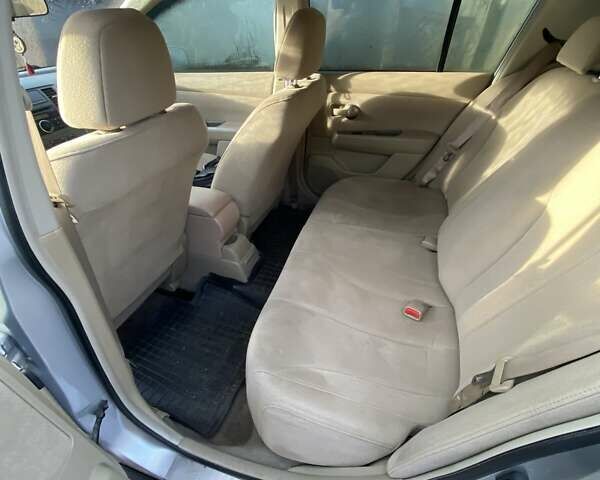 Серый Ниссан Тиида, объемом двигателя 1.6 л и пробегом 230 тыс. км за 5500 $, фото 2 на Automoto.ua