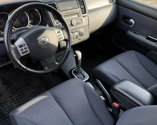 Серый Ниссан Тиида, объемом двигателя 1.6 л и пробегом 167 тыс. км за 7450 $, фото 5 на Automoto.ua