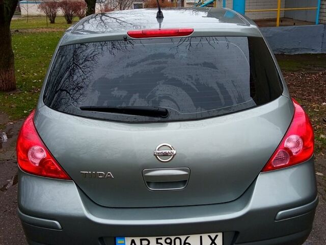 Сірий Ніссан Тііда, об'ємом двигуна 1.6 л та пробігом 213 тис. км за 6250 $, фото 4 на Automoto.ua