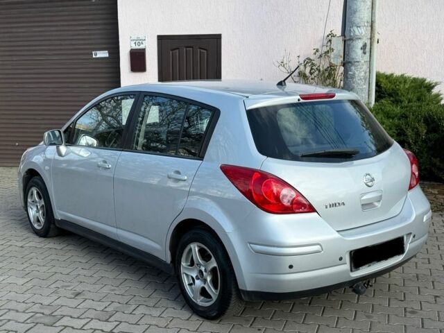 Серый Ниссан Тиида, объемом двигателя 1.6 л и пробегом 167 тыс. км за 7450 $, фото 1 на Automoto.ua