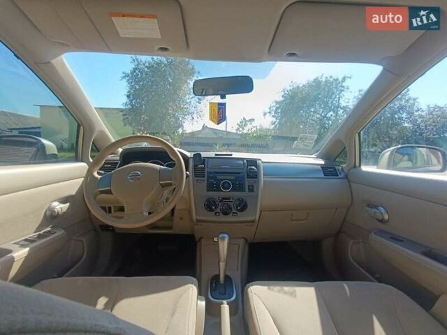 Серый Ниссан Тиида, объемом двигателя 1.6 л и пробегом 122 тыс. км за 7200 $, фото 1 на Automoto.ua