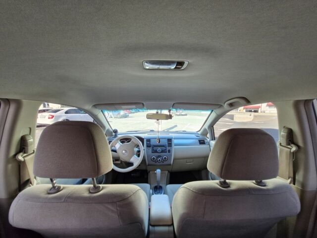 Серый Ниссан Тиида, объемом двигателя 1.6 л и пробегом 192 тыс. км за 5100 $, фото 6 на Automoto.ua