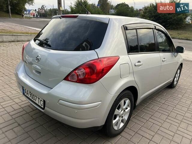 Серый Ниссан Тиида, объемом двигателя 1.6 л и пробегом 148 тыс. км за 6500 $, фото 4 на Automoto.ua