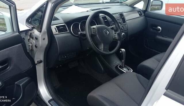 Серый Ниссан Тиида, объемом двигателя 1.6 л и пробегом 198 тыс. км за 7200 $, фото 2 на Automoto.ua