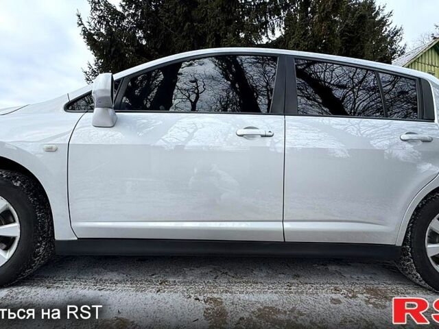 Сірий Ніссан Тііда, об'ємом двигуна 1.6 л та пробігом 155 тис. км за 6760 $, фото 7 на Automoto.ua
