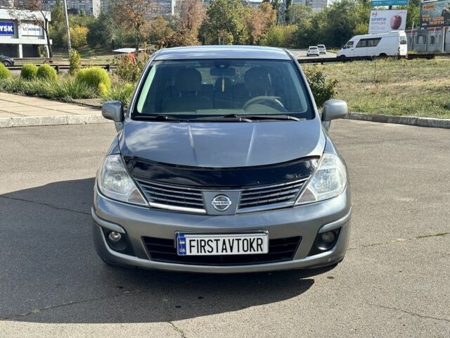 Серый Ниссан Тиида, объемом двигателя 1.8 л и пробегом 182 тыс. км за 5200 $, фото 1 на Automoto.ua