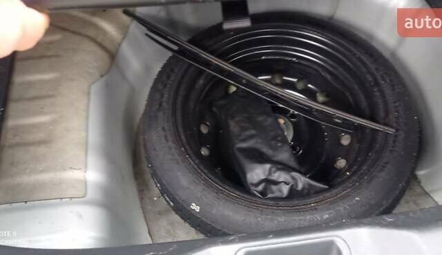 Серый Ниссан Тиида, объемом двигателя 1.6 л и пробегом 198 тыс. км за 7200 $, фото 16 на Automoto.ua