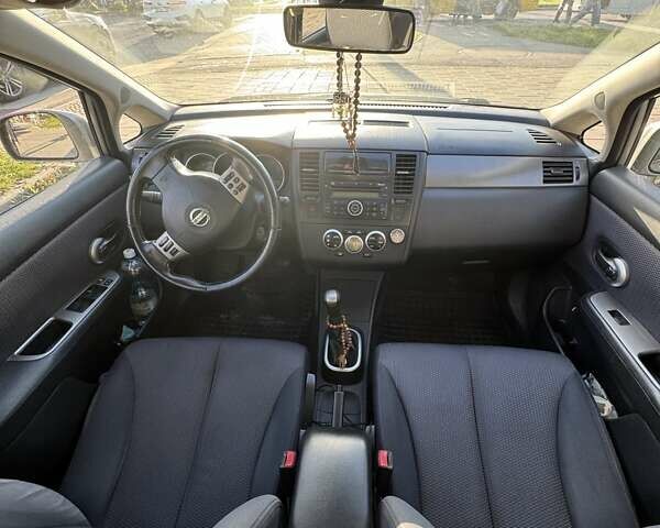 Сірий Ніссан Тііда, об'ємом двигуна 1.6 л та пробігом 196 тис. км за 5800 $, фото 34 на Automoto.ua