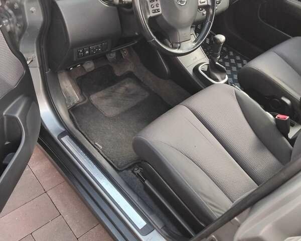 Серый Ниссан Тиида, объемом двигателя 1.6 л и пробегом 210 тыс. км за 6000 $, фото 6 на Automoto.ua