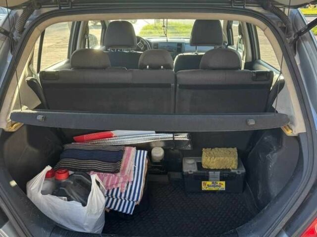 Серый Ниссан Тиида, объемом двигателя 1.6 л и пробегом 199 тыс. км за 5500 $, фото 20 на Automoto.ua