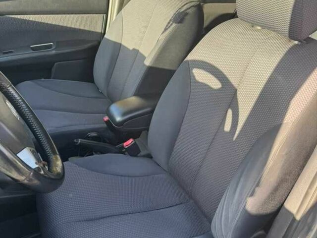 Серый Ниссан Тиида, объемом двигателя 1.6 л и пробегом 199 тыс. км за 5500 $, фото 14 на Automoto.ua