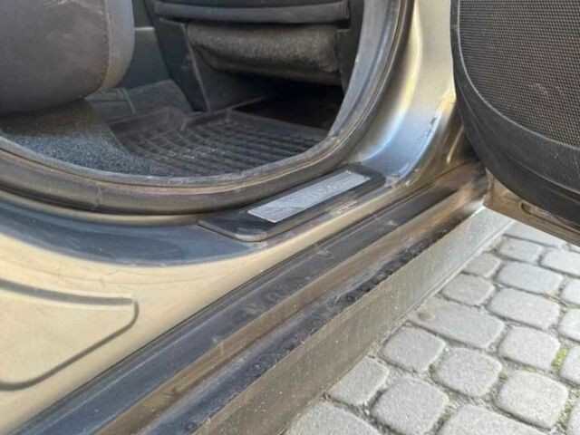 Серый Ниссан Тиида, объемом двигателя 1.6 л и пробегом 199 тыс. км за 5500 $, фото 19 на Automoto.ua