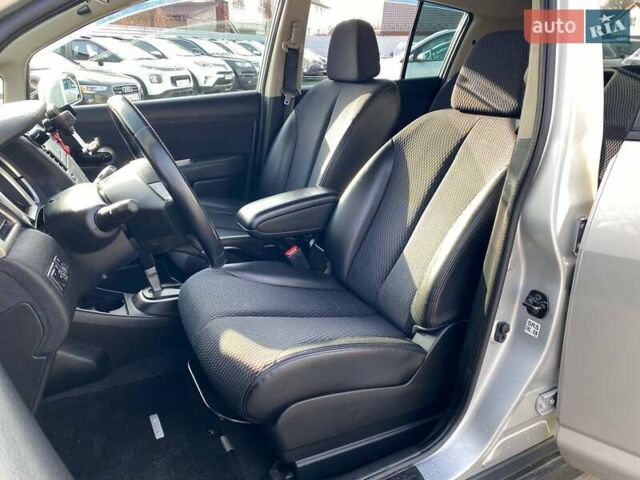 Сірий Ніссан Тііда, об'ємом двигуна 1.5 л та пробігом 107 тис. км за 7590 $, фото 8 на Automoto.ua