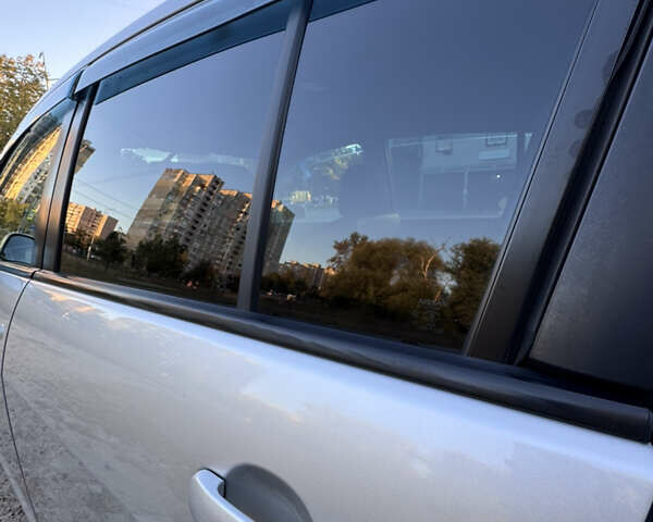 Серый Ниссан Тиида, объемом двигателя 1.5 л и пробегом 106 тыс. км за 8299 $, фото 6 на Automoto.ua