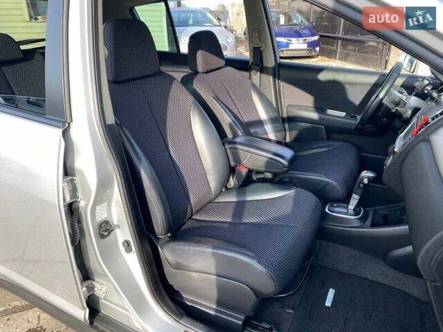 Сірий Ніссан Тііда, об'ємом двигуна 1.5 л та пробігом 107 тис. км за 7590 $, фото 11 на Automoto.ua