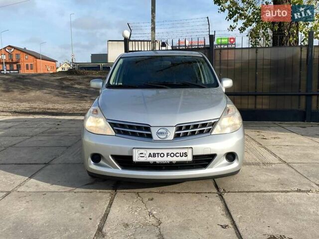 Сірий Ніссан Тііда, об'ємом двигуна 1.5 л та пробігом 107 тис. км за 7590 $, фото 1 на Automoto.ua