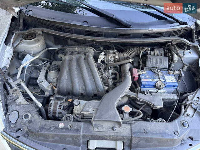 Серый Ниссан Тиида, объемом двигателя 1.5 л и пробегом 106 тыс. км за 8299 $, фото 12 на Automoto.ua